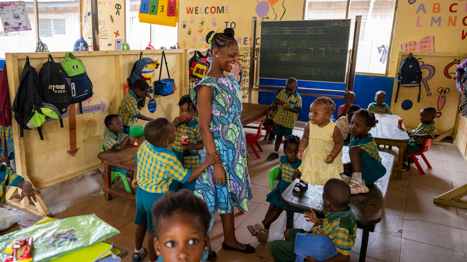 Students play in a classroom.