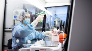A technician working in a laboratory