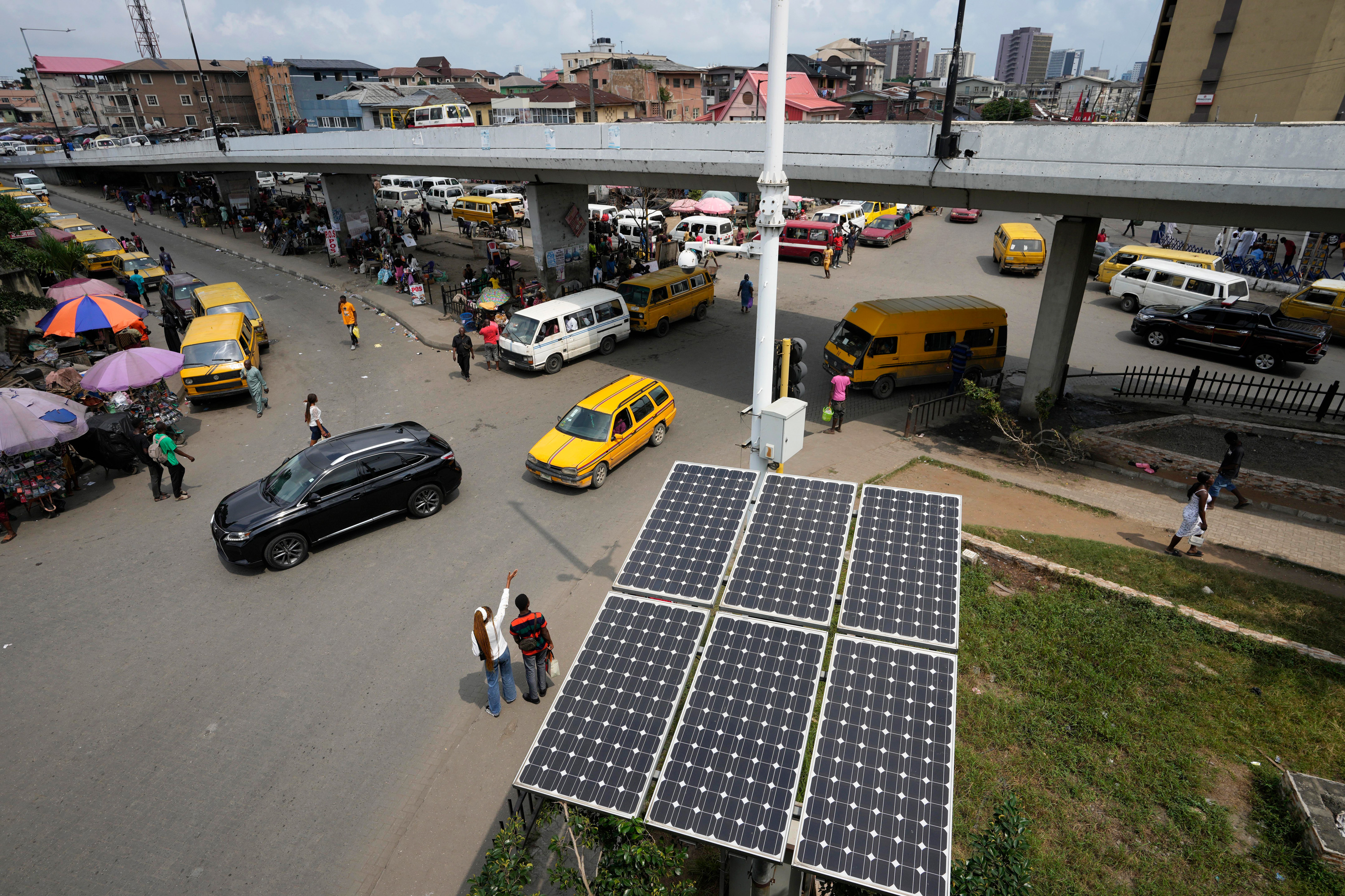 Overhead view of solar panels near a street intersection